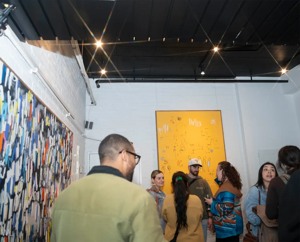 Several individuals are gathered in a room